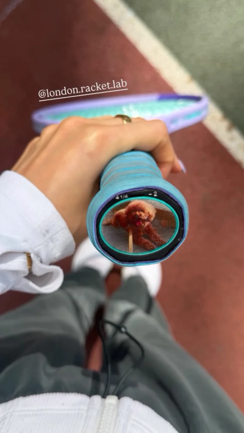 Racket handle with a custom Trapdoor showing a photo of a dog